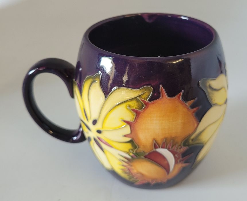 Moorcroft "Endagered species" mug decorated with conkers on a purple ground ,  9cm high - Image 2 of 4