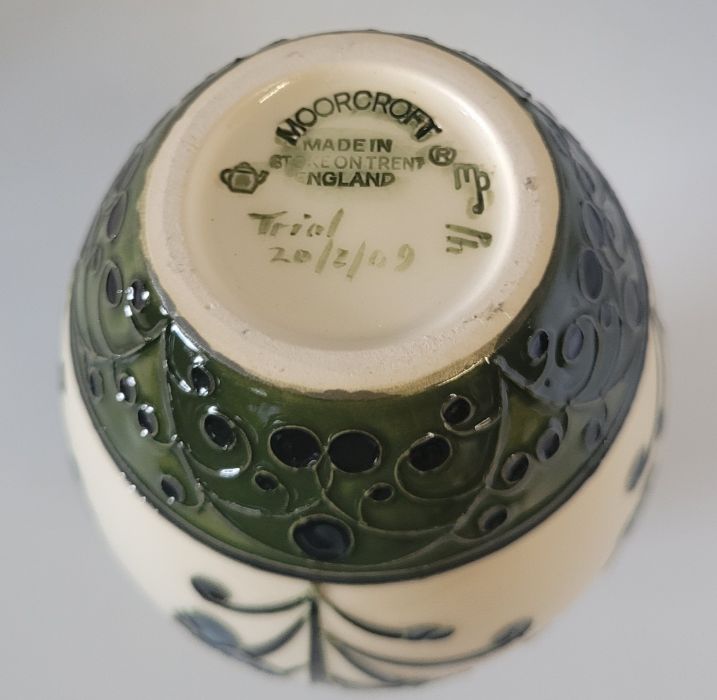 A boxed Moorcroft vase, decorated in the Golden Age pattern  , decorated with  b;lue flowers on a - Image 4 of 4