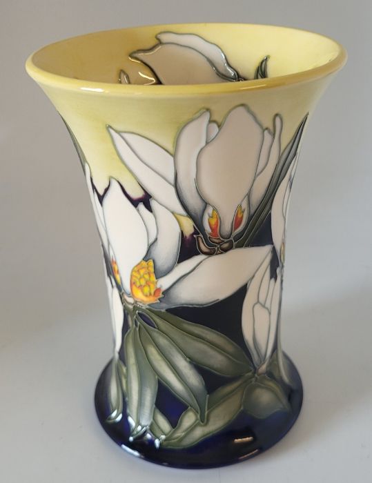 Trial Moorcroft "Mississippi magnolia" vase decorated with magnolias on a blue and yellow ground ,