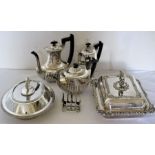 A quantity of plated ware to include two entree dishes and covers, a teapot, hot water jug, coffee