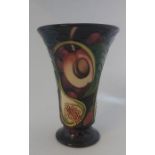 A Boxed Master Moorcroft vase titled  " Queens Choice Masquerade " it is decorated with fruits and