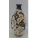 A large boxed Trial Moorcroft vase, titled  " Scrooge "  it is decorated with scenes from Dickens