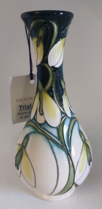 A Trial  " Green Tear " pattern  vase by Moorcroft Decorated with hanging flower heads in whites and