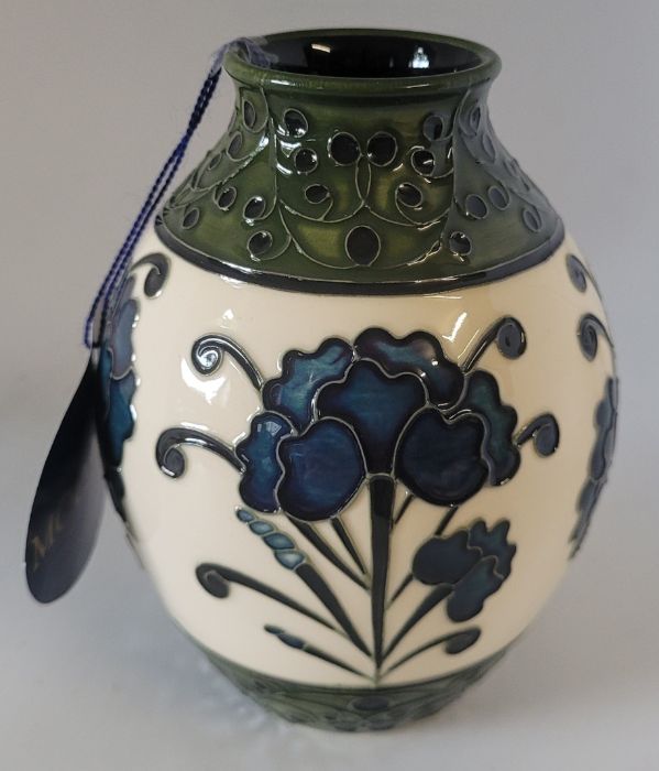 A boxed Moorcroft vase, decorated in the Golden Age pattern  , decorated with  b;lue flowers on a - Image 2 of 4