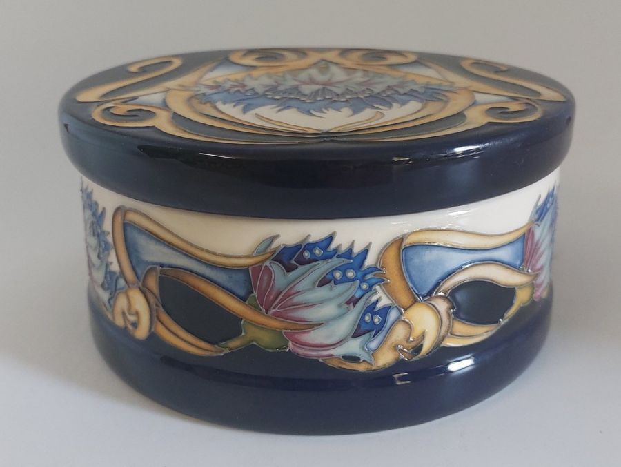 A boxed limited edition 68/150 Cornflower pattern Cavalcade, made by Moorcroft Decorated with a