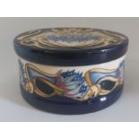 A boxed limited edition 68/150 Cornflower pattern Cavalcade, made by Moorcroft Decorated with a