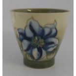 A small Walter Moorcroft design vase C1948, in the Clematis pattern, with a paper label to the base,