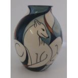 A Boxed Moorcroft vase titled  " Artic Fox"  it is decorated with a banded group of white artic