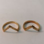 A selection of 9ct gold rings. Featuring two wishbone rings, size T & U; a wedding band, size P; a