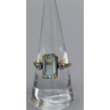 An early 20th century aquamarine and diamond cocktail ring. Featuring an elongated octagon cut