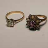 Two 9ct gold Cubic zirconia set rings. Comprising a purple and white cubic zirconia cluster, size M;
