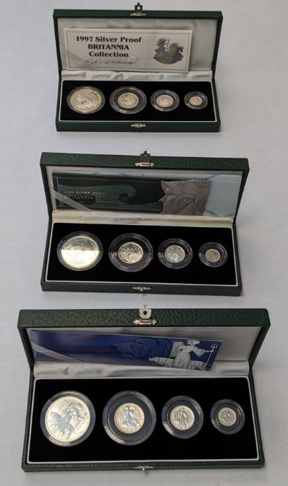 Three boxes of Royal Mint 1997 silver proof Britannia four coin collection.