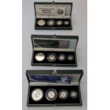 Three boxes of Royal Mint 1997 silver proof Britannia four coin collection.