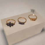 Three 9ct gold dress rings. Featuring a cluster of marquise cut tanzanite surrounding a single