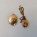 Two oval shaped 9ct gold lockets, along with a 375 stamped curb chain. Total approximate weight 8.