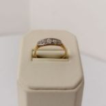 An early 20th century diamond 5 stone ring. Featuring five old European cut diamonds, graduated in