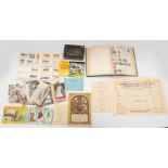 A collection of stamps, postcards, cigarette cards and royal ephemera.
