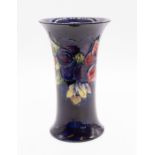 Moorcroft - a Clematis design vase with blooms and foliage pattern, signed and Made in England to