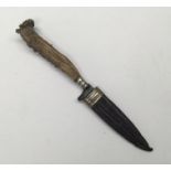 A late 19th / early 20th century German made sheath knife. Antler handle with silver plated