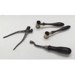 A selection of 19th century firearm tools / accessories. To include: 2 brass powder dram measures,