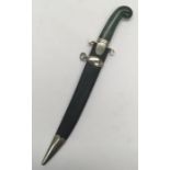An unusual jade handled dagger, with associated scabbard. Nephrite jade handle with nickel mount and