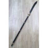 A 19th century, or possibly earlier Chinese Pudao or ‘horse cutter’ broadsword. Stained wooden shaft