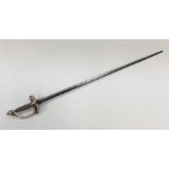 An 18th century continental rapier sword, with brass clamshell guard, knuckle bow and pommel. Copper