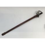 A WW1 era 1897 pattern infantry officers sword with leather field scabbard. Standard pieced nickel