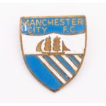 Manchester City: A rare, mid-1930s Manchester City enamel supporters badge. Measuring approx. 23MM