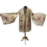 An antique Nanki Poo stage costume from the Mikado made from cotton lined silk brocade (1)