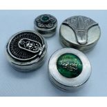 A collection of Egyptian and Arabic white metal pill boxes. The Egyptian pieces are all  marked