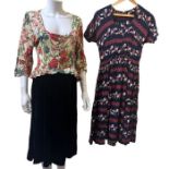 Two 1940s dresses to include a rayon crepe dress with novelty print featuring matadors and