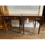 A pair of Victorian and later mahogany sofa tables, reeded edge top with twin dropleaves, single