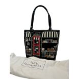 A fun Lulu Guinness tote bag, the embroidered canvas outer depiction a pet shop with cats and