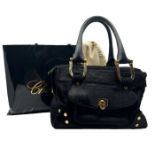 A black pony skin Chopard handbag with rose gold tone hardware, leather handles and a red jacquard