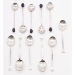 A set of six George VI sterling silver seal end teaspoons, along with George V five coffee bean