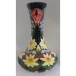 A boxed, tall Yellow Lotus trial vase 2015 made by Moorcroft. Decorated with yellow Daffodils and