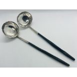 A pair of Georgian baleen handled miniature toddy ladles. With unmarked white metal bowls.