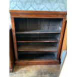 A Victorian mahogany bookcase, rectangular shape, moulded frieze over four tier adjustable saw tooth