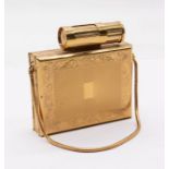 A gold tone Vigu cigarette case, compact, mirror and lipstick, with a snake chain handle.