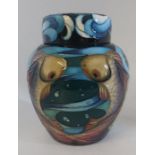 A boxed Museum piece, Lagoon pastern lidded ginger jar made by Moorcroft. Decorated with 2 fishes