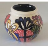 A boxed Moorcroft small vase, decorated in the Christmas Pressies pattern ,dated  2018 5.2cm high  .