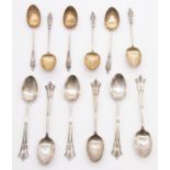 Two sets of six Edward VII teaspoons. Featuring six Apostle teaspoons with scalloped bowls, marked