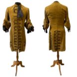 An antique Dijon mustard frock coat, 18th century style from costumier B.J. Simmons & Co, Covent