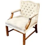 A Gainsborough influence open armchair, cartouche shaped button back rest, curved moulded arm rests,