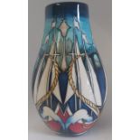A boxed City of Sails vase, made by Moorcroft. Decorated with boat sails and ropes with crashing