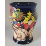 A boxed trial piece Moorcroft vase, decorated in the mice pattern  , with mice warming themselves by