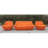 Vintage Furniture: An early 1970s' three-piece suite in orange bouclé fabric consisting of long