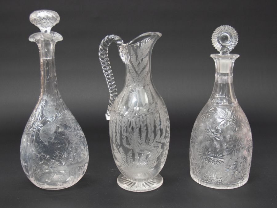 ***WITHDRAWN*** Three 19th Century etched glass decanters with peacock foliage and flower detail,