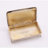 A George IV silver snuff box, raised border, striped engraved decoration, central vacant